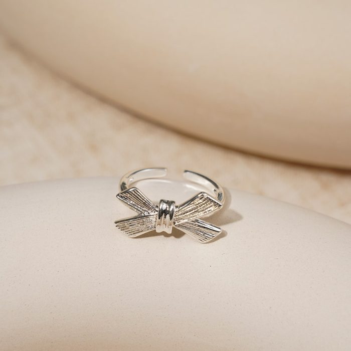 2024 New Minimalist Design Brass Silver-Plated Knot Bow Women's Fashion Resizable Rings - Image 2