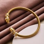Luxury Gold Crystal-Studded Cable Bangle – Modern Twist Design for Women - Image 3