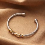 Two-Tone Twisted Cable Stainless Steel Bangle – Gold & Silver Harmony with Crystal Accents - Image 3